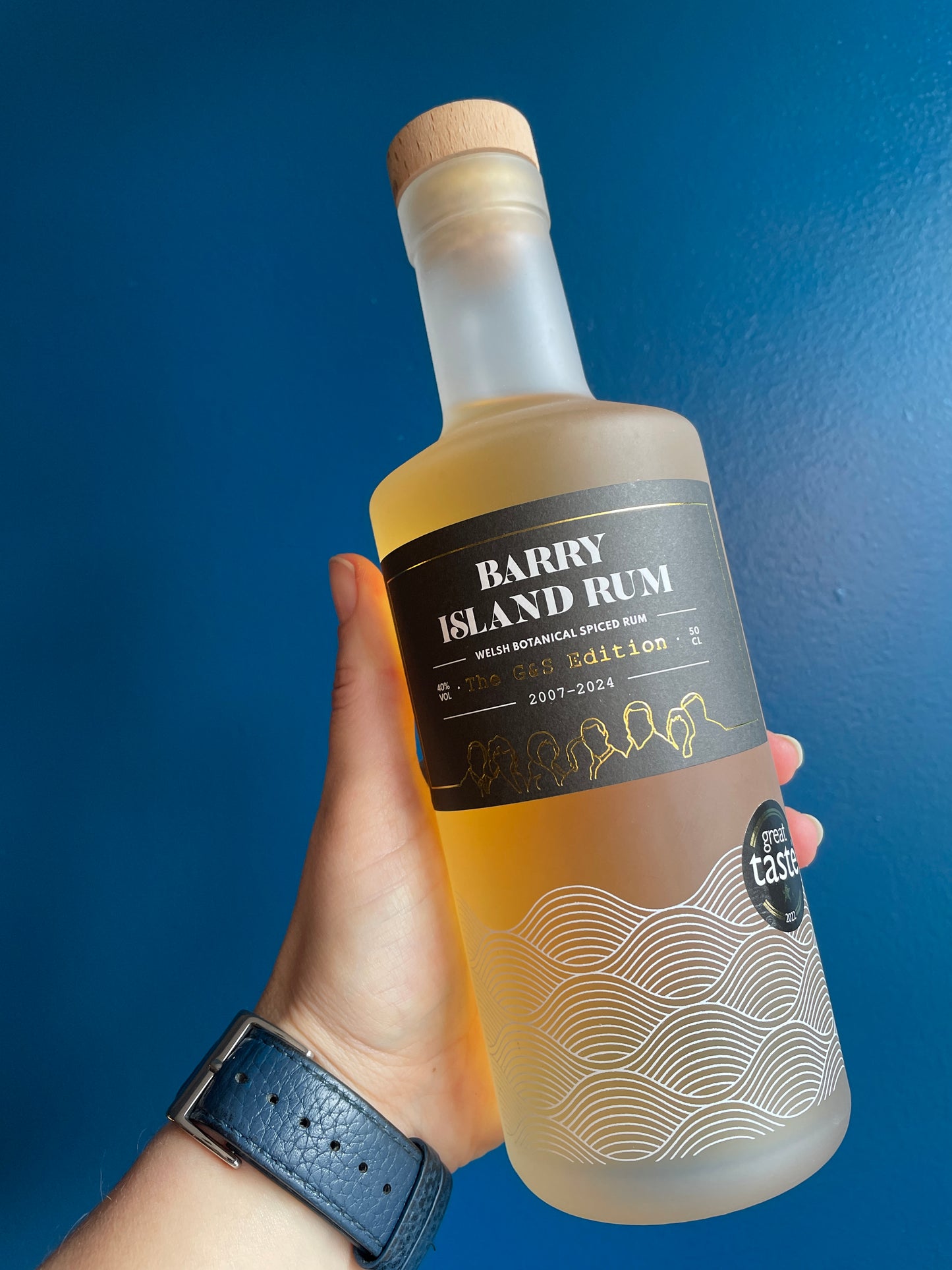 A hand holding A bottle of Gavin & Stacey Inspired Limited Edition G&S bottle of Barry Island Spiced Rum