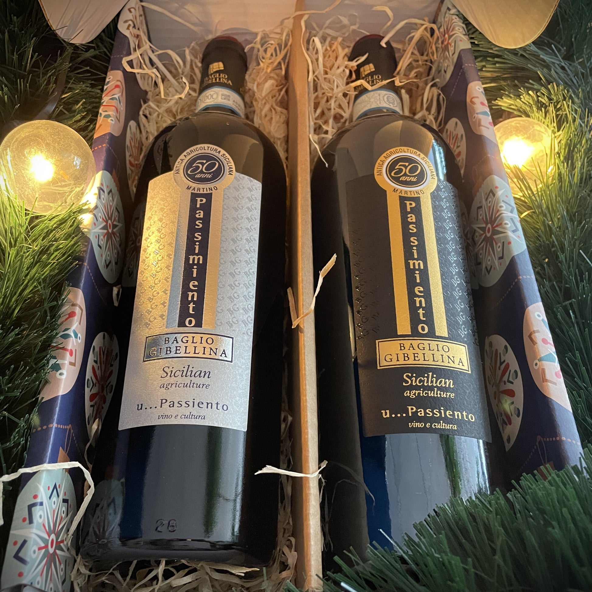 2 bottles of wine in a Christmas wine gift box