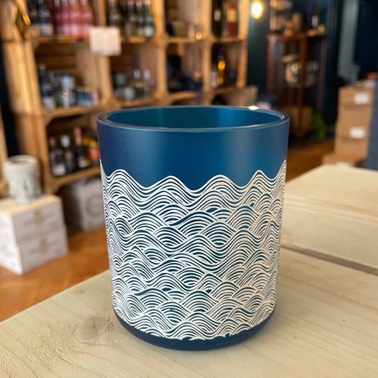 An upcycled Barry Island Gin Glass on a table
